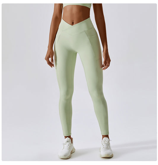 Nude Feel Yoga Pants Hip Lifting Pocket Quick Drying Fitness Pants Criss Cross Waist Head Skinny Running Sports Pants Women - Iyanka