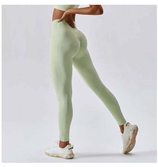 Nude Feel Yoga Pants Hip Lifting Pocket Quick Drying Fitness Pants Criss Cross Waist Head Skinny Running Sports Pants Women - Iyanka